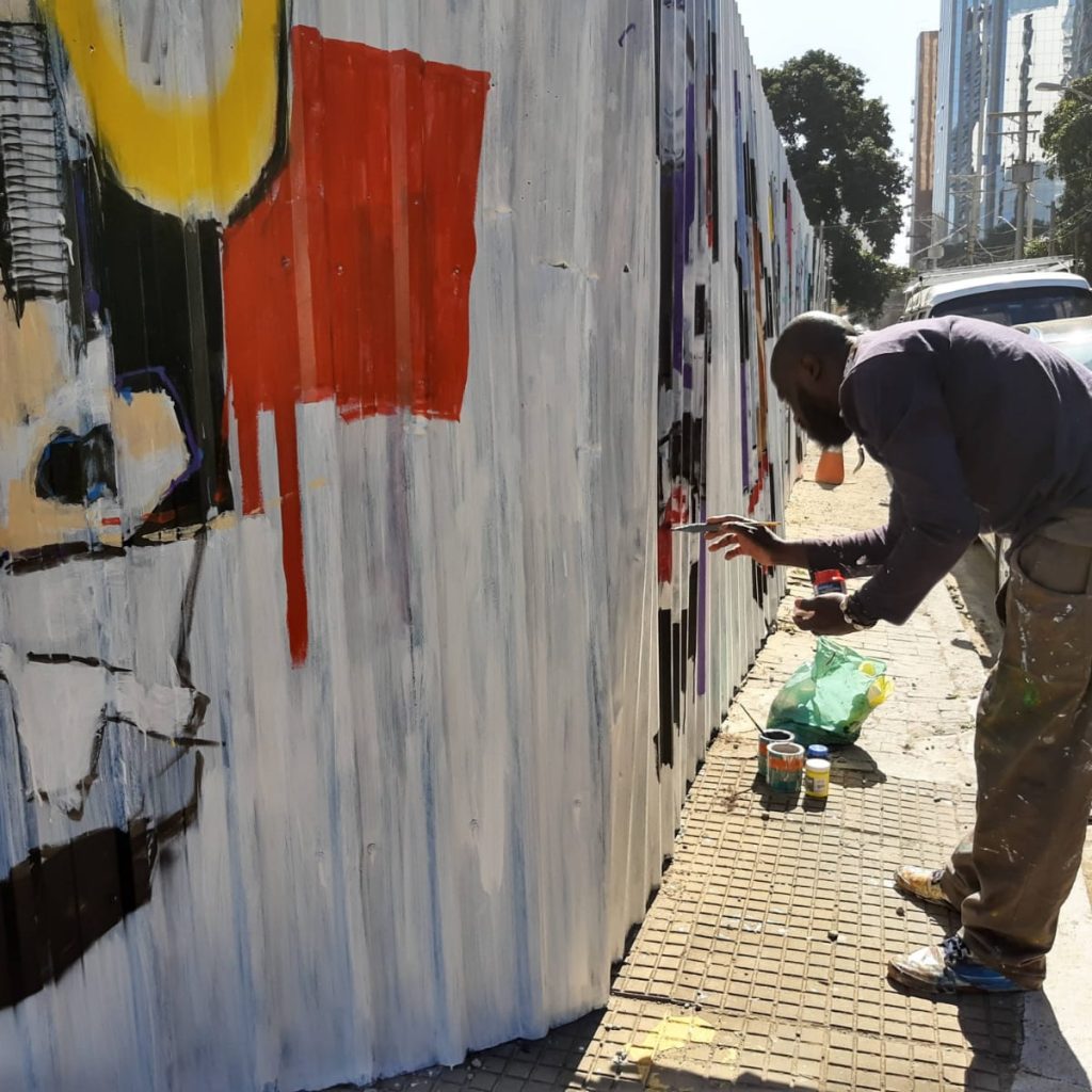 artist painting the wall